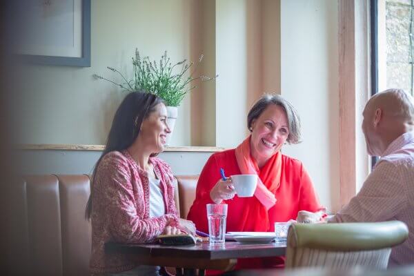 maxine ward celebrant in a planning meeting with a couple