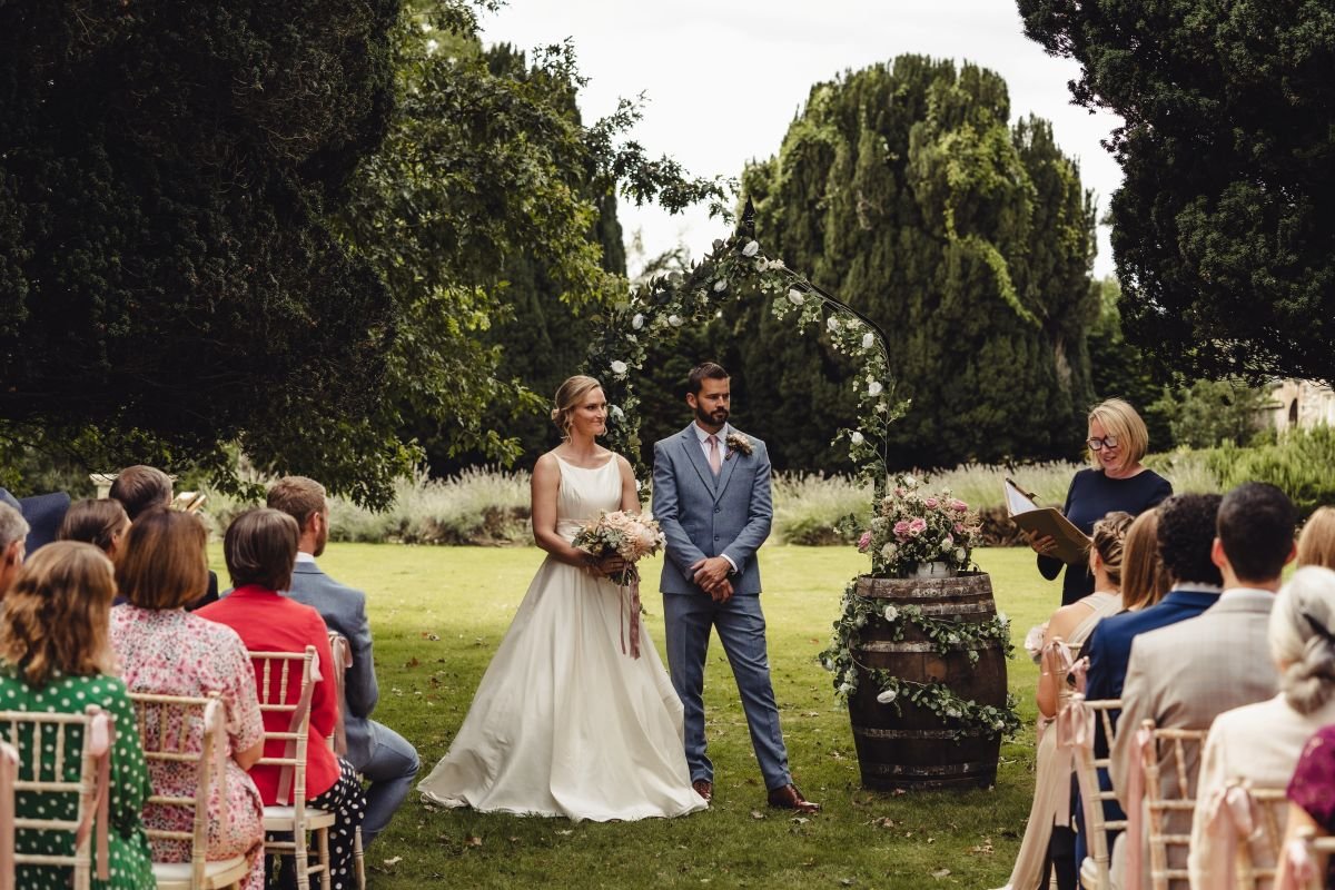 A couple celebrating with their guests immediately after the ceremony