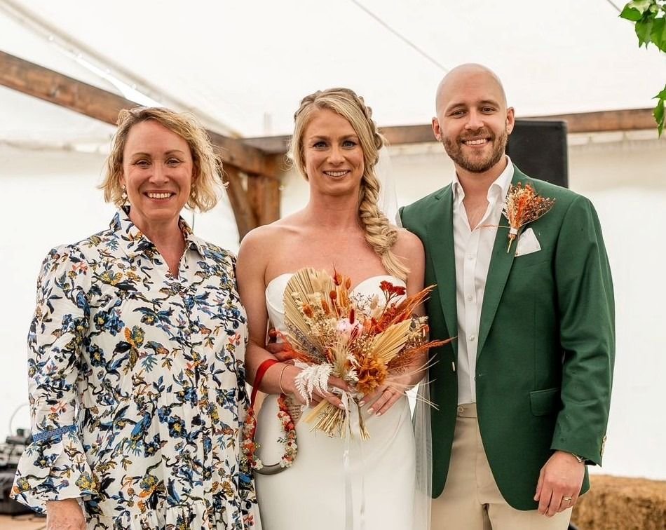 A couple during their outdoor wedding ceremony