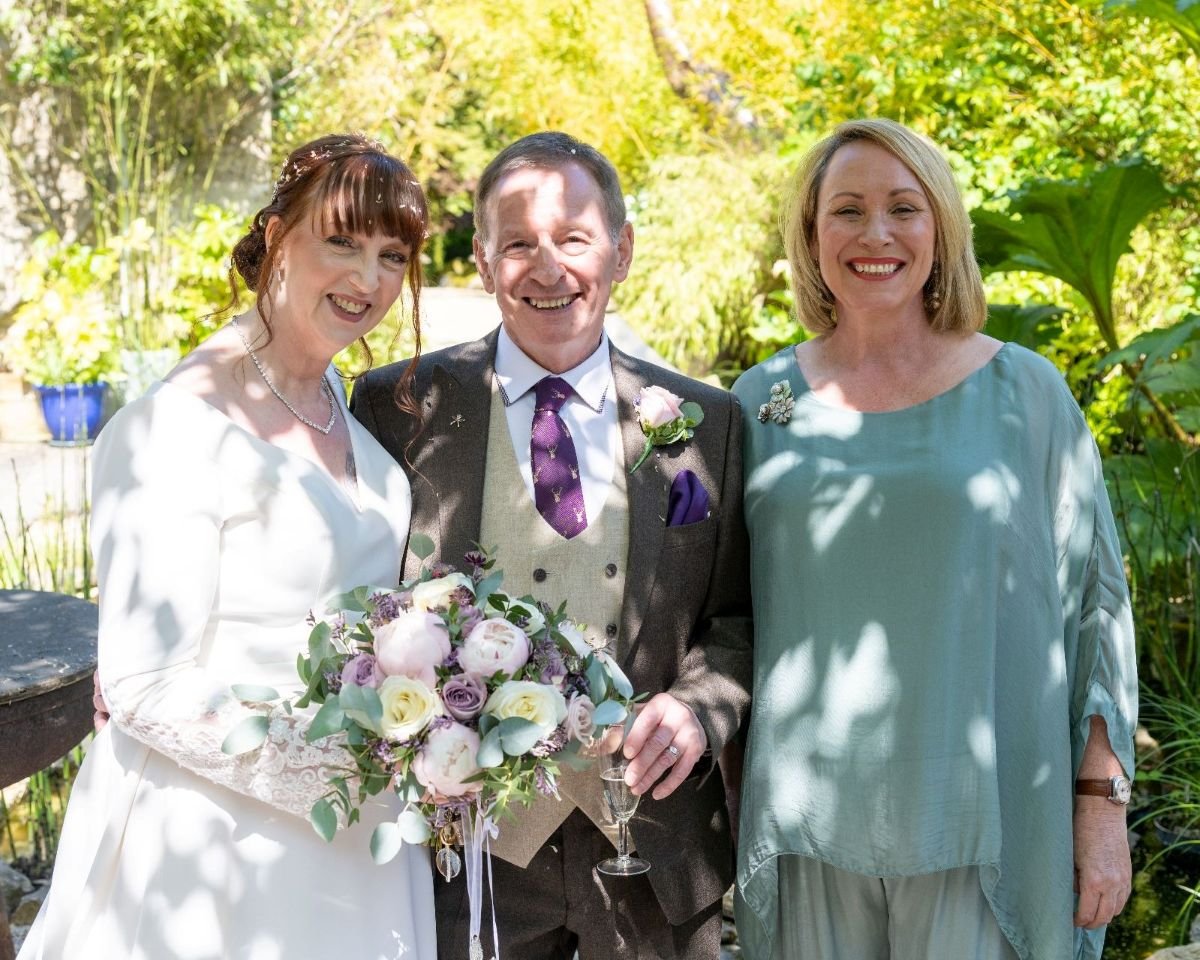 A handfasting ritual during a celebrant-led wedding ceremony