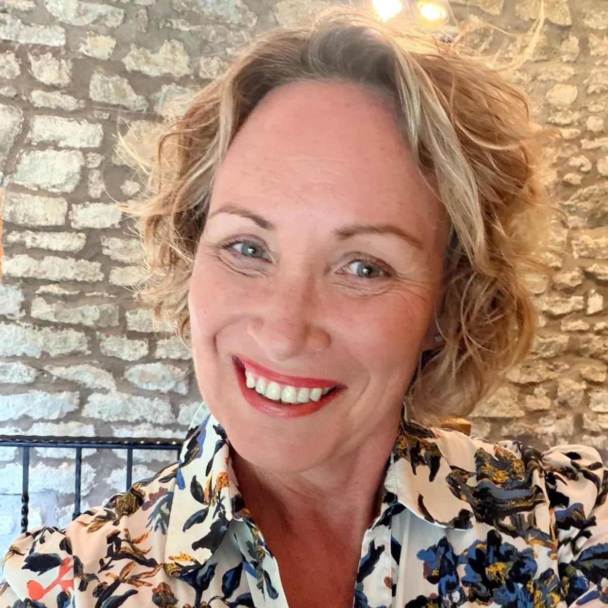 A warm, relaxed portrait of wedding celebrant Maxine Ward
